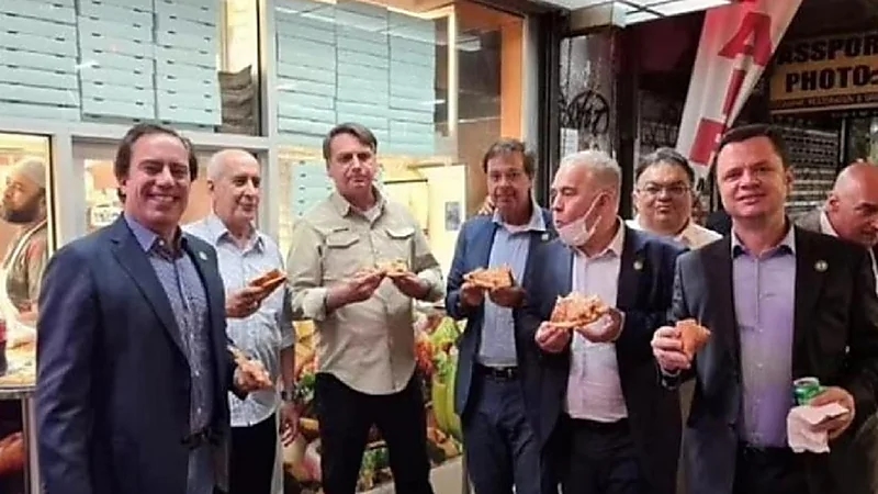 مطعم يرفض دخول الرئيس البرازيلي ويجبره على تناول البيتزا في الشارع