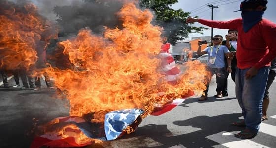 بالصور.. تظاهرات فى عاصمة الفلبين ضد زيارة ترامب المرتقبة