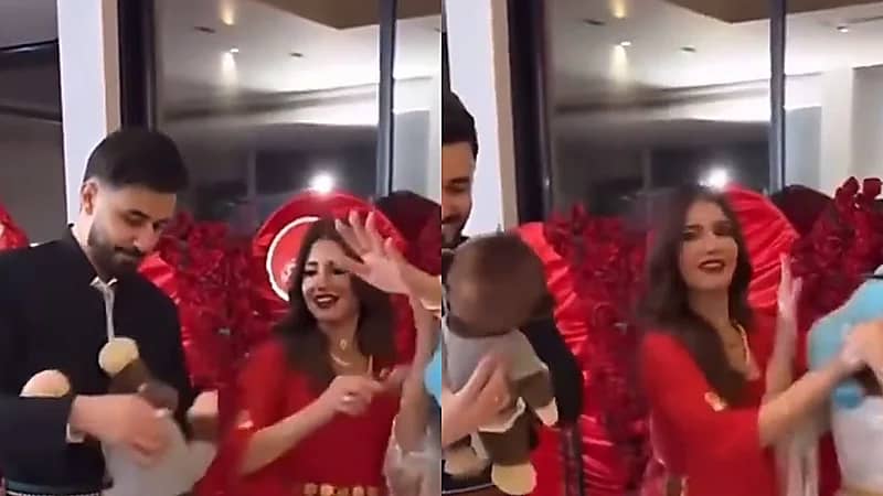 شيرين بيوتي وزوجها يرقصان بدمية بشكل غريب ويثيران الجدل .. فيديو