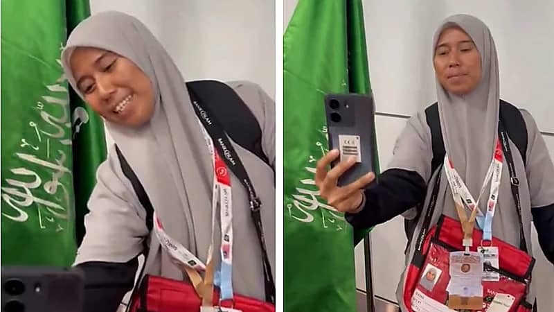 ماليزية تلتقط سيلفي مع العلم السعودي عقب إنهاء إجراءات الحج ... فيديو