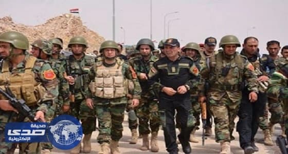 قوات الحشد الشعبي العراقي تحرر قاعدة جوية من مسلحي " داعش "