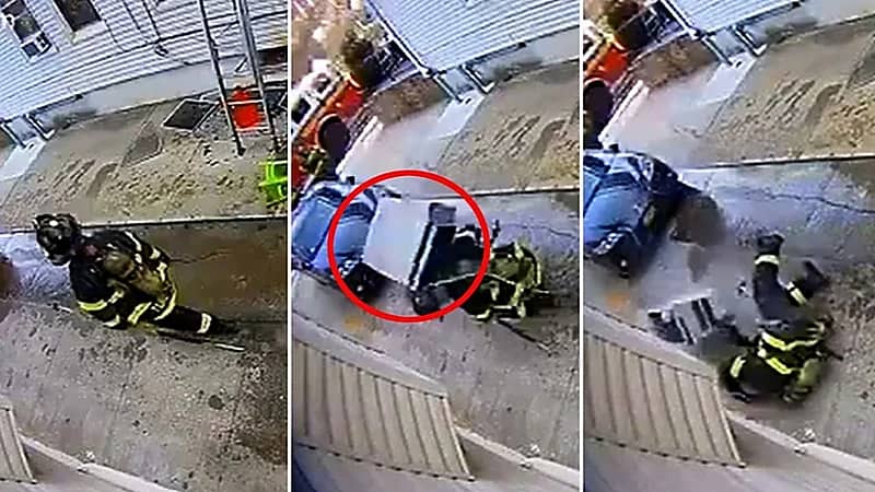 شاهد.. لحظة سقوط مكيف هواء على رأس رجل إطفاء أثناء عمله